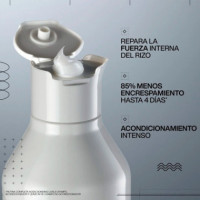 Acidic Bonding Curls Acondicionador para Reparar los Rizos Exigentes.  REDKEN