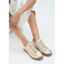 Deportiva en Rejilla y Detalles Metalizados de LOLA CASADEMUNT