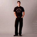 Camiseta holgada universitaria con logo gráfico