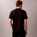 Camiseta holgada universitaria con logo gráfico