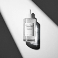 Tone Brightening Capsule Ampoule
sérum Facial Iluminador  SKIN1004