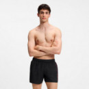 Bañador tipo shorts con logos repetidos