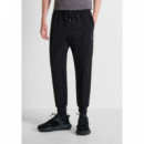 Pantalones de felpa carrot fit en interlock de algodón con logo en placa metálica de Antony Morato