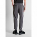 Pantalones de felpa carrot fit en interlock de algodón con logo en placa metálica de Antony Morato