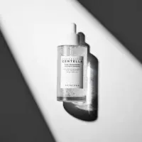 Tone Brightening Capsule Ampoule
sérum Facial Iluminador  SKIN1004